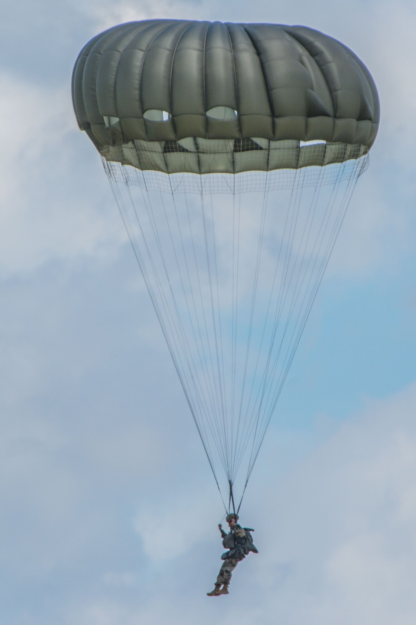 1-507th Parachute Infantry Regiment cadre from the Basic Airborne Course from Fort Benning parachutes out of a C-130 Hercules assigned to the 908th Airlift Wing here at Maxwell Air Force Base, Ala., July 7, 2016. The Airmen from the 908th AW and the Soldiers from the 1-507th PIR worked together to provide needed combat training that benefited both services.(U.S. Air Force photo by Trey Ward)