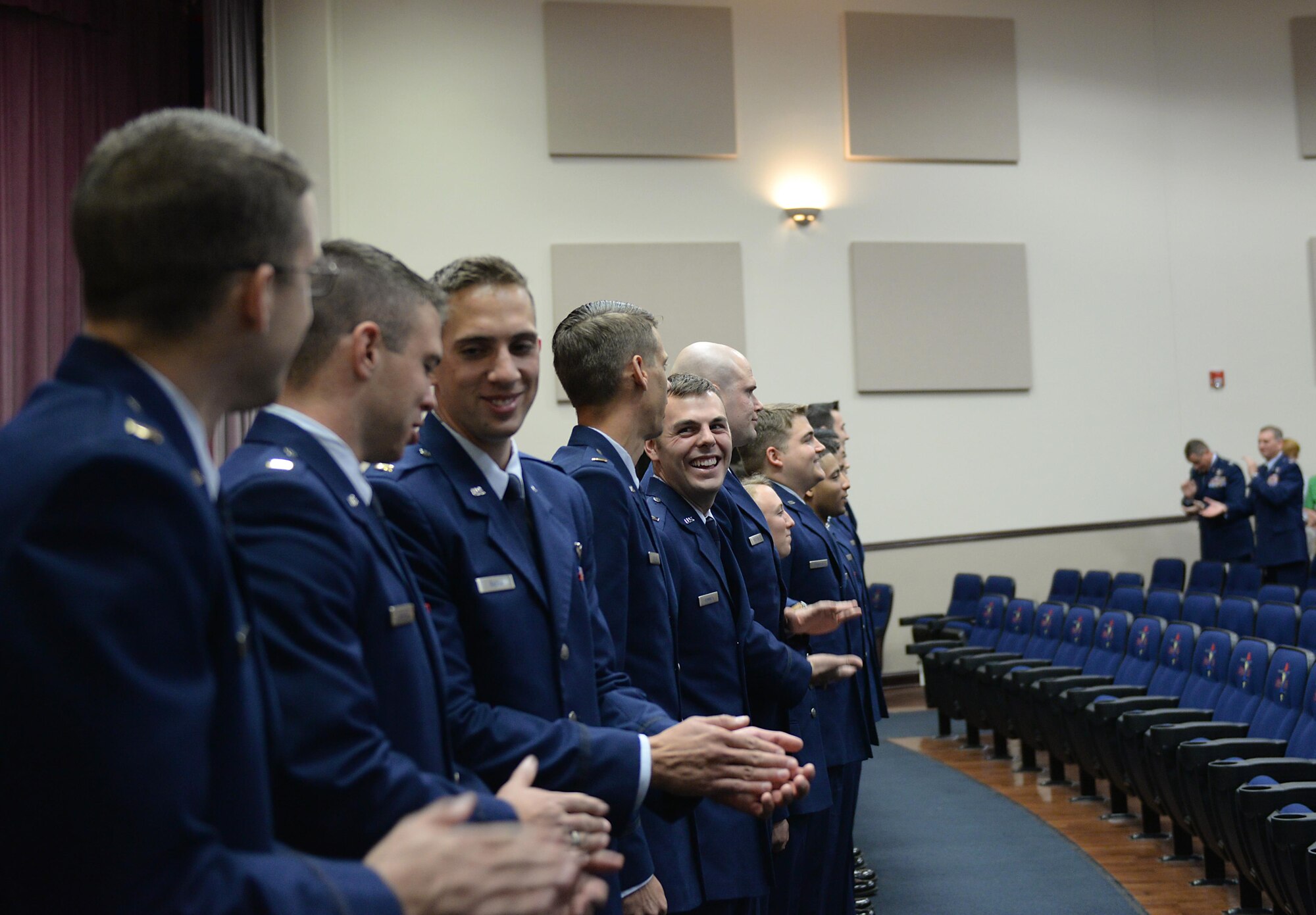 Specialized Undergraduate Pilot Training Class 17-11 celebrates after earning their wings on Columbus Air Force Base, Mississippi, June 30, 2017. Twenty-four officers graduated with SUPT Class 17-11. (U.S. Air Force photo by Airman 1st Class Keith Holcomb)