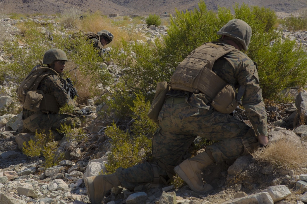 TWENTYNINE PALMS, Calif. – Marines with Echo Company, 2nd Battalion, 24th Marine Regiment, 4th Marine Division, Marine Forces Reserve, coordinate movement to their next objective at Range 410A at Marine Corps Air Ground Combat Center Twentynine Palms, California on June 26, 2017. The battalion conducted live-fire platoon attacks at the range during Integrated Training Exercise 4-17, which requires battalions and squadrons to come together as a cohesive team through shared planning, briefing, rehearsals, execution and debriefing.