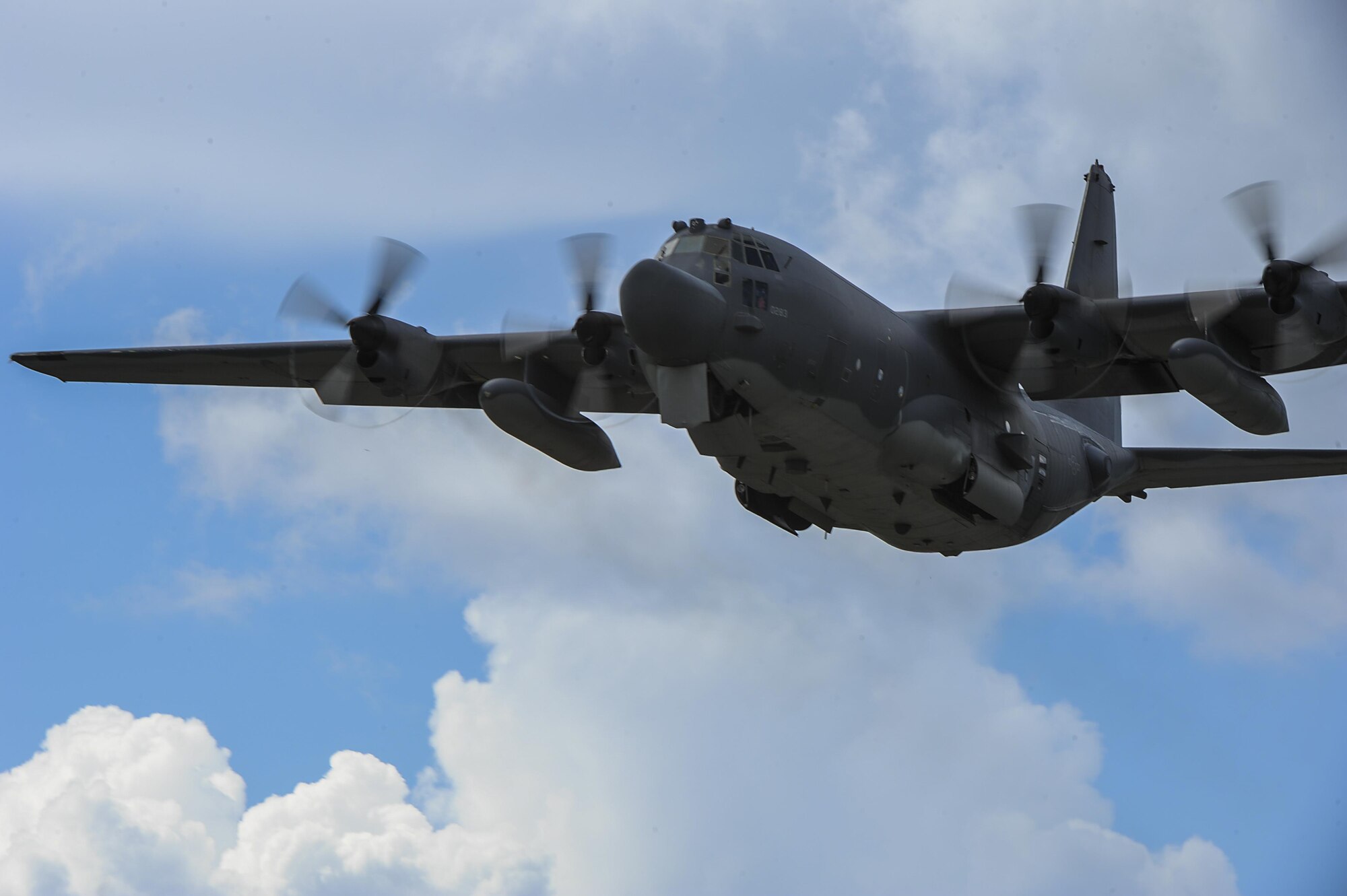 A 15th Special Operations Squadron MC-130H Combat Talon II flies over Hurlburt Field, Fla., during a training mission, July 7, 2017. Aircrew with the 15th SOS train to be able to operate the MC-130H in missions like providing infiltration and exfiltration of special operations forces, and can perform equipment resupply missions to hostile or denied territory anytime, anyplace. (U.S. Air Force photo by Airman 1st Class Rachel Yates)