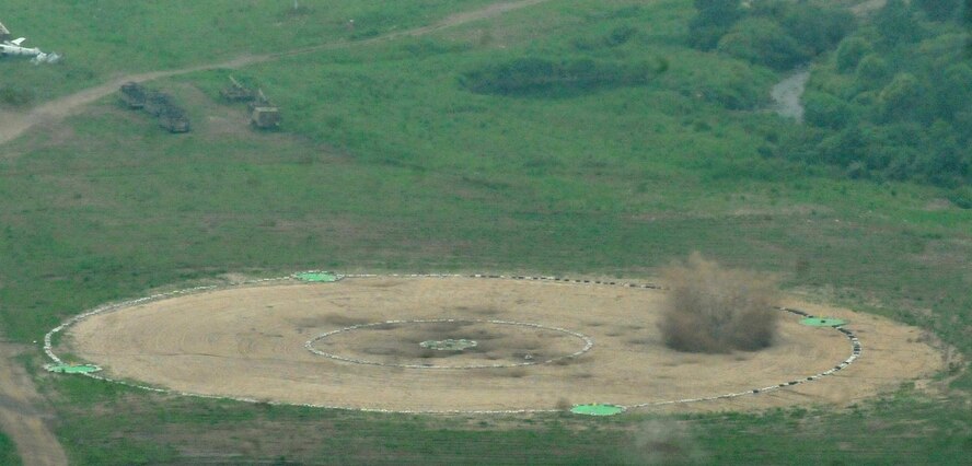 Inert weapons dropped from U.S. Air Force B-1B Lancers practicing attack capabilities impact the Pilsung Range, July 7. The Lancers are assigned to the 9th Expeditionary Bomb Squadron, deployed from Dyess Air Force Base, Texas, and took off from Andersen Air Force Base, Guam to conduct a sequenced bilateral mission with South Korean F-15 and Koku Jieitai (Japan Air Self-Defense Force) F-2 fighter jets, July 7. The bombers hit their target on time despite inclement weather, showcasing the combined air forces’ ability to overcome the elements. The mission is in response to a series of increasingly escalatory action by North Korea, including a launch of an intercontinental ballistic missile (ICBM) on July 3. (U.S. Army photo by Staff Sgt. Steven Schneider)