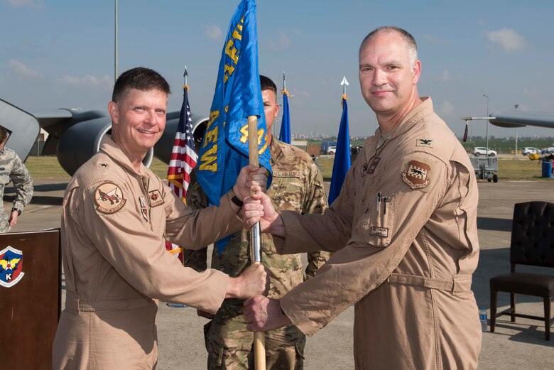 U.S. Air Force Col. Scott Hoffman (right), 447th Air Expeditionary Group incoming commander, assumes command from Brig. Gen. Kyle Robinson, 332nd Air Expeditionary Wing commander, July 7, 2017, at Incirlik Air Base, Turkey. A change of command ceremony is a tradition that represents a formal transfer of authority and responsibility from the outgoing commander to the incoming commander. (U.S. Air Force photo by Airman 1st Class Devin M. Rumbaugh)