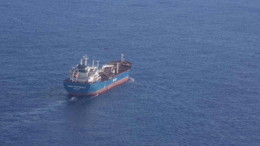 The Nord Nightingale, a container ship from Singapore, assisted in a concerted rescue effort with the 920th Rescue Wing of two German citizens in distress at sea July 7, 2017. The victim's vessel caught fire approximately 500 nautical miles off the east coast of southern Florida. At the request of the U.S. Coast Guard's Seventh District in Miami, the 920th RQW was alerted by the Air Force Rescue Coordination Center at Tyndall Air Force Base, Florida, to assist in the long-range search and rescue. Approximately 80 wing Citizen Airmen and four wing aircraft helped execute the rescue mission to include, maintenance, operations and support personnel. (U.S. Air Force photo by Master Sgt. Mark Borosch)
