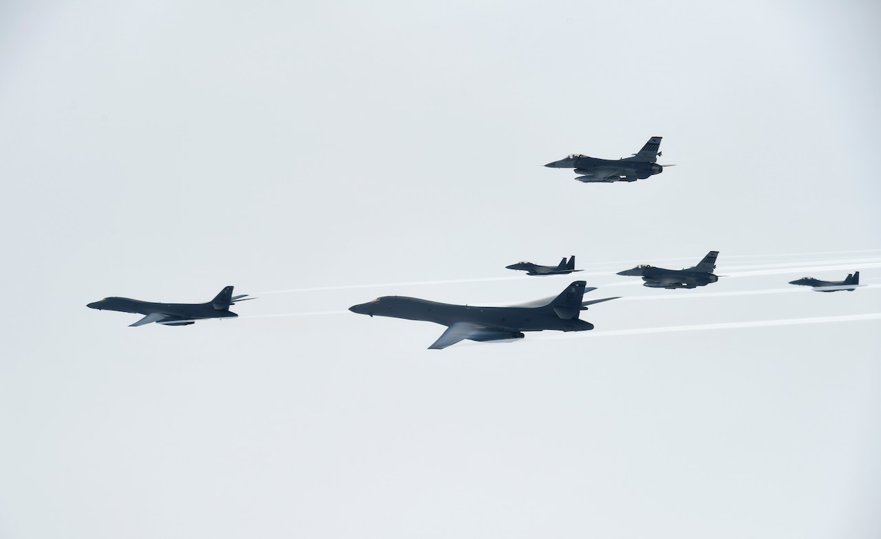 U.S. Air Force B-1B Lancers assigned to the 9th Expeditionary Bomb Squadron, deployed from Dyess Air Force Base, Texas, fly with South Korean F-15 and U.S. Air Force F-16 fighter jets over the Korean Peninsula, July 7, 2017. The Lancers departed Andersen Air Force Base, Guam, to conduct a sequenced bilateral mission with South Korean F-15s and Japan Air Self-Defense Force F-2 fighter jets. Photo courtesy of the South Korean air force