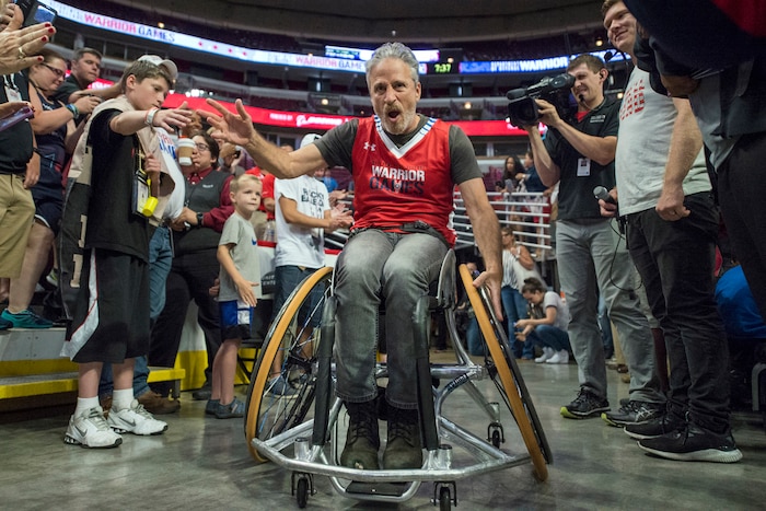 Movie and television personality Jon Stewart enters the United Center for a celebrity wheelchair basketball game with athletes in the 2017 Department of Defense Warrior Games in Chicago, July 7, 2017. DoD photo by EJ Hersom