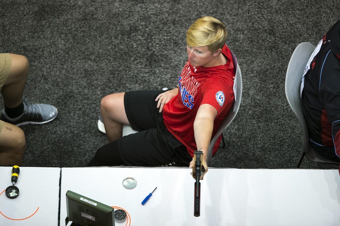 Marine Corps Staff Sgt. Danielle Pothoof competes in pistol shooting during the 2017 Dept. of Defense Warrior Games in Chicago July 6, 2017. The DoD Warrior Games are an annual event allowing wounded, ill and injured service members and veterans to compete in Paralympic-style sports. (DoD photo by EJ Hersom)
