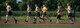 Runners nearly complete their first lap of six during the 1.5 mile fitness assessment July 8, 2017, Scott Air Force Base, Illinois. (U.S. Air Force photo by Tech. Sgt. Christopher Parr)