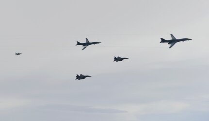 U.S. Air Force B-1B Lancers assigned to the 9th Expeditionary Bomb Squadron, deployed from Dyess Air Force Base, Texas, fly with South Korean F-15 and U.S. Air Force F-16 fighter jets over the Korean Peninsula, July 7. The Lancers departed Andersen Air Force Base, Guam to conduct a sequenced bilateral mission with South Korean F-15s and Koku Jieitai (Japan Air Self-Defense Force) F-2 fighter jets. The mission is in response to a series of increasingly escalatory action by North Korea, including a launch of an intercontinental ballistic missile (ICBM) on July 3. (photo courtesy of Republic of Korea air force)