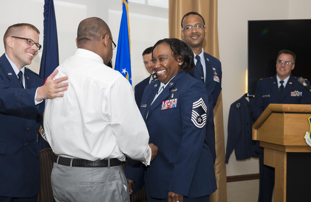 Former Senior Master Sgt. Francenia Reed-McKnight, is promoted to the rank of Chief Master Sgt. during an official ceremony, July 8, 2017, Niagara Falls Air Reserve Station, N.Y. Reed-McKnight is the first member of the Force Support Squadron to be promoted from within the squadron to the rank of Chief since its inception. (U.S. Air Force photo by Tech. Sgt. Stephanie Sawyer)