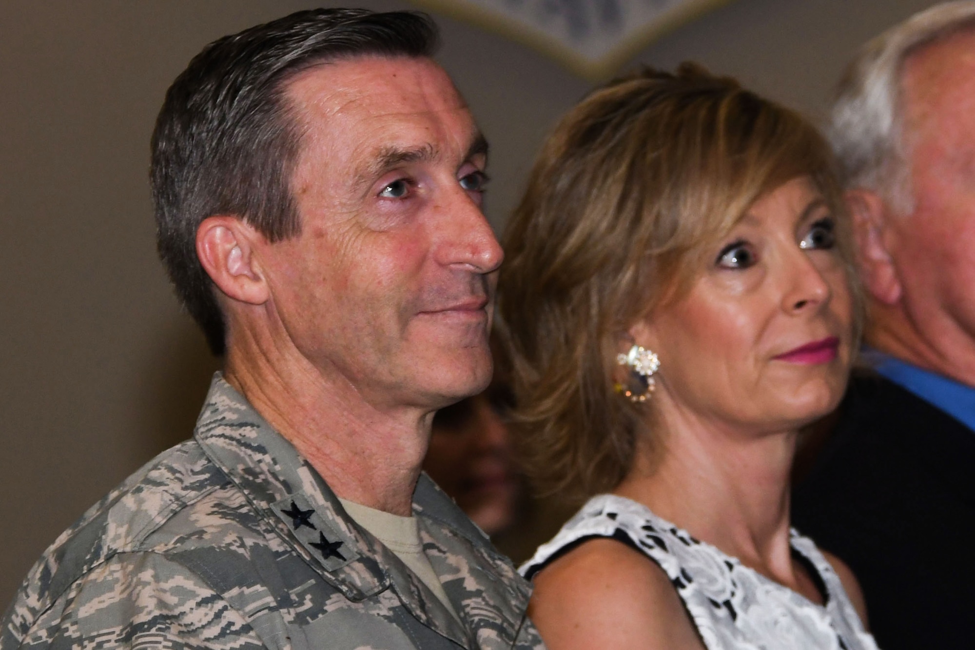U.S. Air Force Maj. Gen. Bruce Miller, 10th Air Force commander, and his wife, Dori, look on during a change of command ceremony for the 307th Mission Support Group at Barksdale Air Force Base, La., July 8, 2017.   He was on hand to witness Col. Sandra Vandiviere take command of the unit. She began her active duty career in 1993 as a Wing Weather Officer.  In 1997, she transferred to the Air Force Reserve and since has served in numerous reserve assignments in the Personnel, Weather, Executive Officer and Plans & Programs career fields. Her assignments include service on active duty, as a traditional reservist, an individual mobilization augmentee, Active Guard and Reserve and as an Air Reserve Technician. (U.S. Air Force photo by Master Sgt. Ted Daigle/released)
