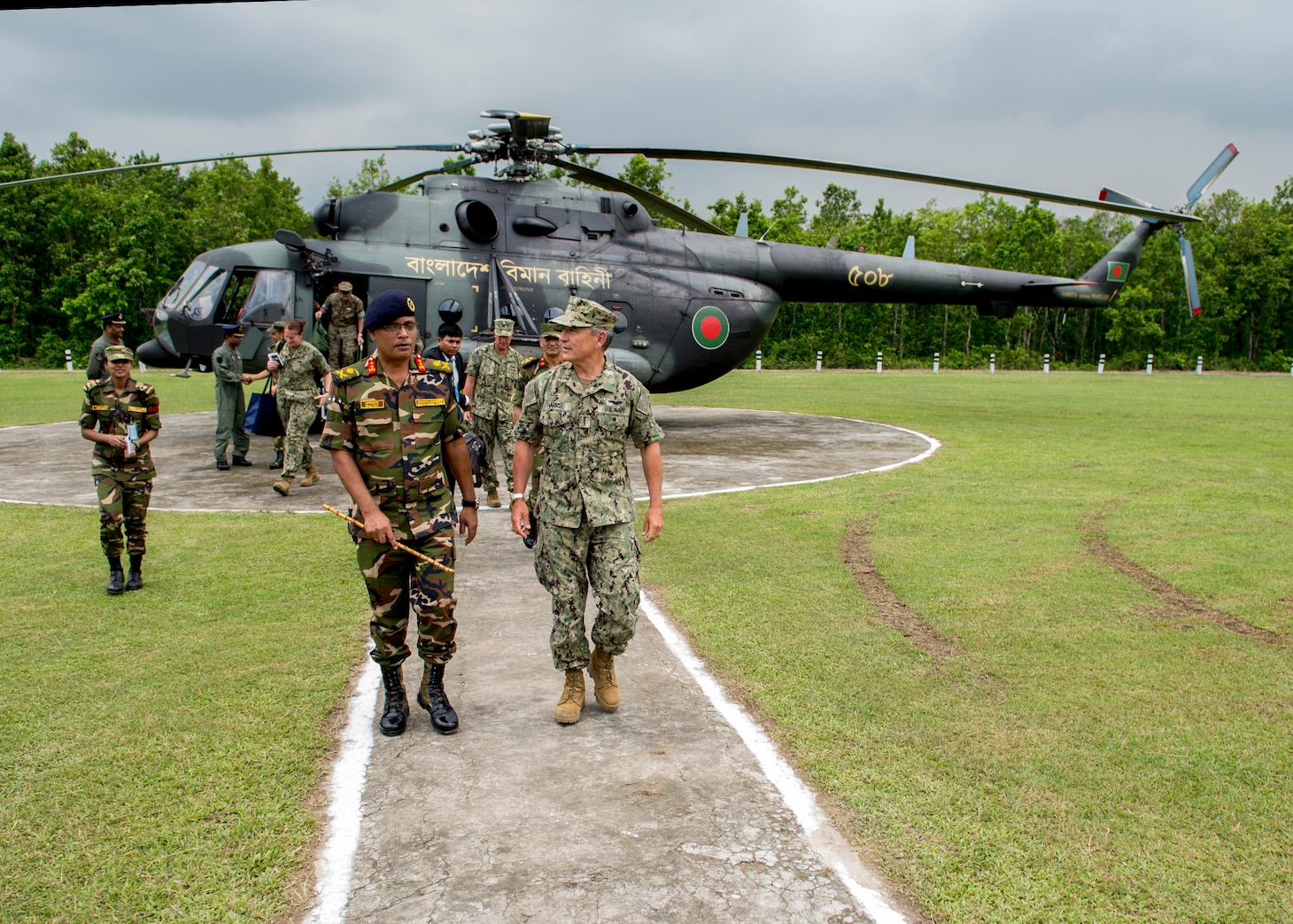 170708-N-WY954-210GAZIPUR, BANGLADESH (July 8, 2017) – Adm. Harry Harris, Commander U.S. Pacific Command (PACOM), is greeted by Commandant of the Bangladesh Institute of Peace Support Operations Training (BIPSOT), Maj. Gen. Enayet Ullah, after arriving by helicopter. This is Harris’ first visit to Bangladesh as PACOM commander. During the visit he met with counterparts and government officials for discussions on military cooperation and regional security initiatives in the Indo-Asia Pacific. (U.S. Navy photo by Mass Communications Specialist 2nd Class Robin W. Peak/ Released)