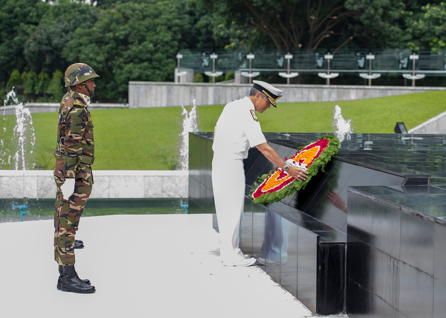 170708-N-WY954-488DHAKA, BANGLADESH (July 8, 2017) – Adm. Harry Harris, Commander U.S. Pacific Command (PACOM), lays a wreath at the Skikha Anirban eternal flame to honor those who sacrificed their lives for Bangladesh’s liberation in 1971. This is Harris’ first visit to Bangladesh as PACOM commander. During the visit he met with counterparts and government officials for discussions on military cooperation and regional security initiatives in the Indo-Asia Pacific. (U.S. Navy photo by Mass Communications Specialist 2nd Class Robin W. Peak/ Released)