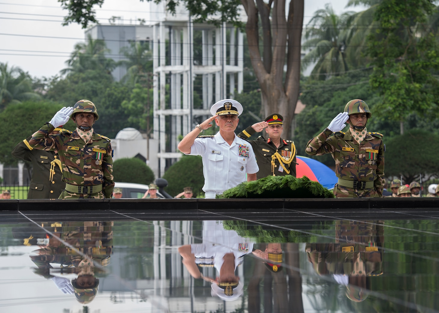 170708-N-WY954-522DHAKA, BANGLADESH (July 8, 2017) – Adm. Harry Harris, Commander U.S. Pacific Command (PACOM), and members of the Bangladesh Army render a salute during a wreath laying ceremony at the Skikha Anirban eternal flame to honor those who sacrificed their lives for Bangladesh’s liberation in 1971. This is Harris’ first visit to Bangladesh as PACOM commander. During the visit he met with counterparts and government officials for discussions on military cooperation and regional security initiatives in the Indo-Asia Pacific. (U.S. Navy photo by Mass Communications Specialist 2nd Class Robin W. Peak/ Released)
