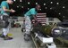 U.S. Air Force Senior Airman Michael Smith, 25th Aircraft Maintenance Unit 3-man, prepares to load a missile onto an A-10 Thunderbolt II during a quarterly 51st Maintenance Group weapons load competition at Osan Air Base, Republic of Korea, July 7, 2017. Load crews who performed well in their monthly proficiency loads and quarterly evaluations were chosen to compete in the competition. (U.S. Air Force photo by Airman 1st Class Gwendalyn Smith)