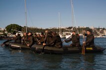 NOUMEA, NEW CALEDONIA— Marines and Sailors with 3rd Battalion, 4th Marine Regiment, currently deployed to Koa Moana 17, paddle boats while participating in the French Nautical Commando Course during exercise Koa Moana 17, July 3, 2017, in Noumea, New Caledonia. Koa Moana 17 is designed to improve theater security, and conduct law enforcement and infantry training in the Pacific region in order to enhance interoperability with partner nations. (U.S. Marine Corps Photo by Sgt. Douglas D. Simons)