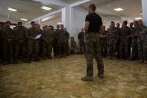 Capt. Roch Sardin, commanding officer of the Centre D’instruction Nautique, front, gives closing remarks after Marines and Sailors with 3rd Battalion, 4th Marine Regiment, participated in the French Nautical Commando Course during exercise Koa Moana 17, July 3, 2017, in Noumea, New Caledonia. Koa Moana 17 is designed to improve theater security, and conduct law enforcement and infantry training in the Pacific region in order to enhance interoperability with partner nations. (U.S. Marine Corps Photo by Sgt. Douglas D. Simons)