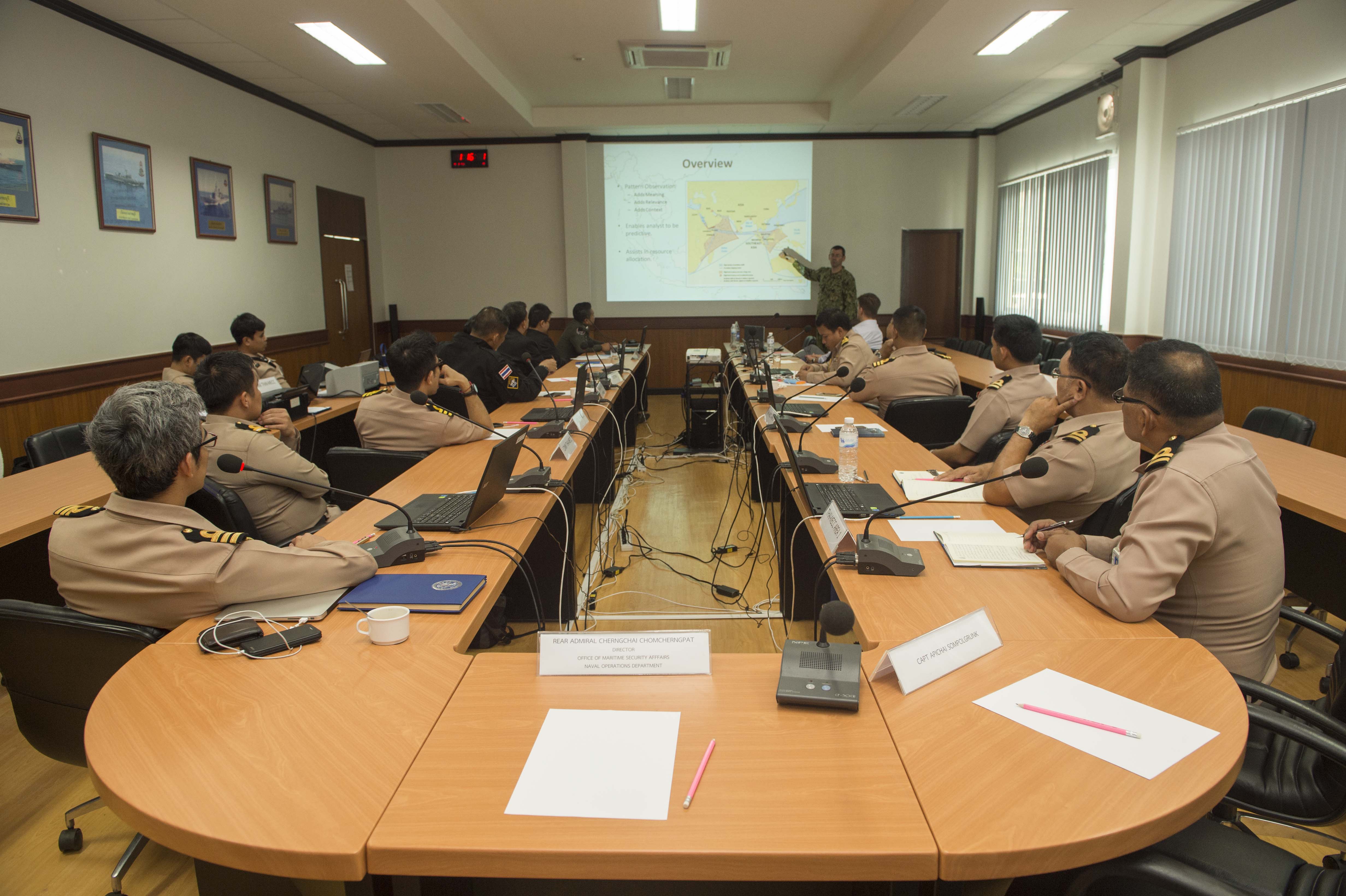 170530-N-PD309-105 SATTAHIP NAVAL BASE, Thailand (May 30, 2017) Lt. David Andre, assigned to Commander, Destroyer Squadron Seven, instructs members of the RoyalThai Armed Forces during a Basic Maritime Analysis Training Program, designed to increase analytic skills that support and strengthen maritime awareness during Cooperation Afloat Readiness and Training (CARAT) Thailand. CARAT is a series of Pacific Command-sponsored, U.S Pacific Fleet-led bilateral exercises held annually in South and Southeast Asia to strengthen relationships and enhance force readiness. CARAT exercise events cover a broad range of naval skill areas and disciplines including surface, undersea, air, and amphibious warfare; maritime security operations; riverine, jungle, and explosive ordnance disposal operations; combat construction; diving and salvage; search and rescue; maritime patrol and reconnaissance aviation; maritime domain awareness; military law, public affairs and military medicine; and humanitarian assistance and disaster response. (U.S. Navy photo by Mass Communication Specialist 3rd Class Deven Leigh Ellis/Released)