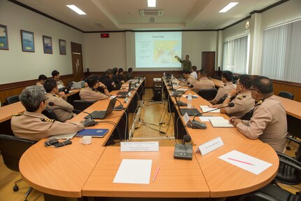170530-N-PD309-105 SATTAHIP NAVAL BASE, Thailand (May 30, 2017) Lt. David Andre, assigned to Commander, Destroyer Squadron Seven, instructs members of the RoyalThai Armed Forces during a Basic Maritime Analysis Training Program, designed to increase analytic skills that support and strengthen maritime awareness during Cooperation Afloat Readiness and Training (CARAT) Thailand. CARAT is a series of Pacific Command-sponsored, U.S Pacific Fleet-led bilateral exercises held annually in South and Southeast Asia to strengthen relationships and enhance force readiness. CARAT exercise events cover a broad range of naval skill areas and disciplines including surface, undersea, air, and amphibious warfare; maritime security operations; riverine, jungle, and explosive ordnance disposal operations; combat construction; diving and salvage; search and rescue; maritime patrol and reconnaissance aviation; maritime domain awareness; military law, public affairs and military medicine; and humanitarian assistance and disaster response. (U.S. Navy photo by Mass Communication Specialist 3rd Class Deven Leigh Ellis/Released)