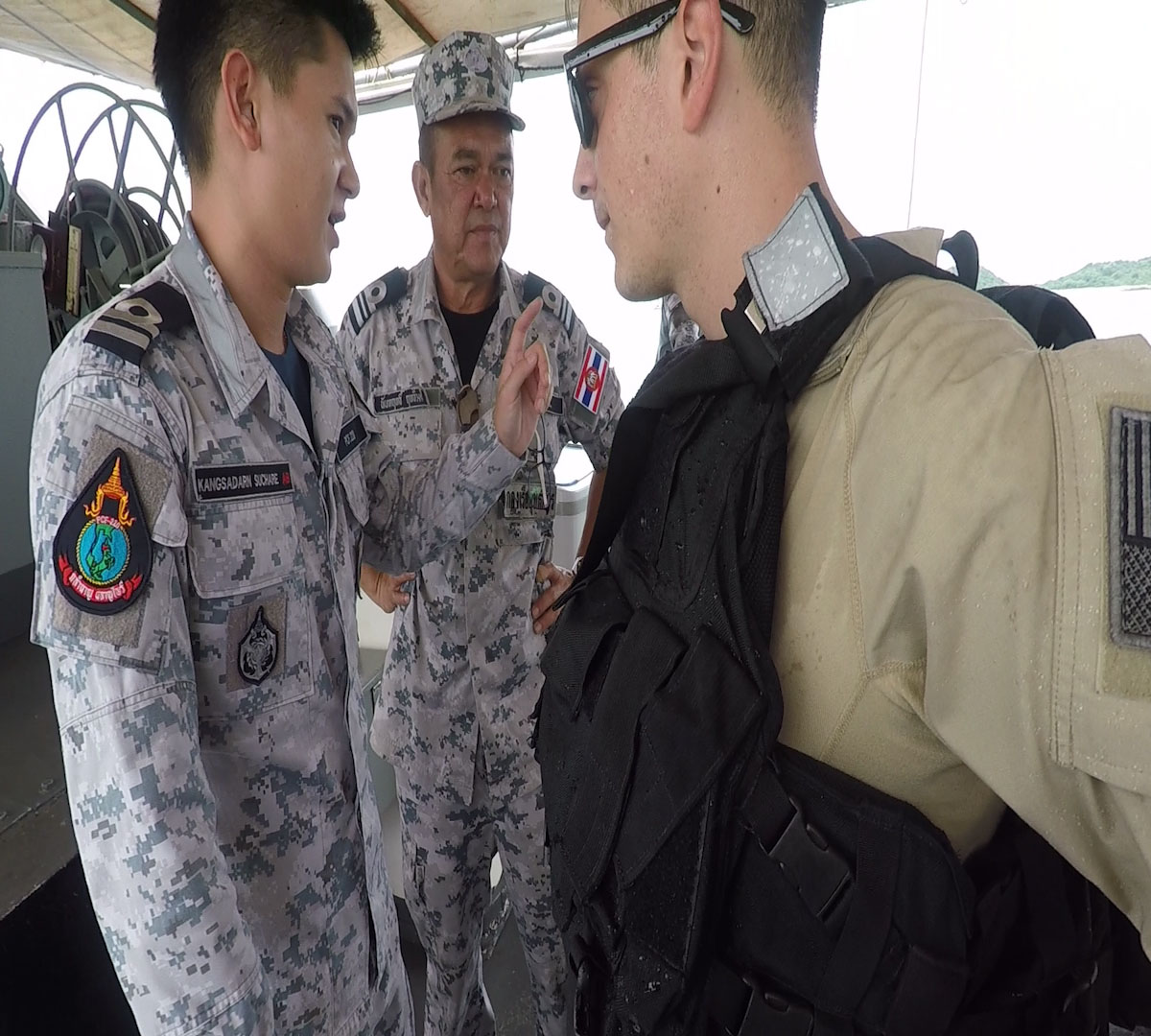 170531-M-YO248-006 SATTAHIP NAVAL BASE, Thailand (May 31, 2017) A USS Coronado (LCS) Visit Board Search and Seizure team member discusses tactics, techniques and procedures with Royal Thai Navy colleagues before a training simulation during Cooperation Afloat Readiness and Training Thailand 2017 May 31.  Cooperation Afloat Readiness and Training (CARAT) is a series of PACOM sponsored, U.S. Pacific Fleet led bilateral exercises held annually in South and Southeast Asia to strengthen relationships and enhance force readiness. CARAT exercise events cover a broad range of naval skill areas and disciplines including surface, undersea, air and amphibious warfare; maritime security operations; riverine, jungle and explosive ordnance disposal operations; combat construction; diving and salvage; search and rescue; maritime patrol and reconnaissance aviation; maritime domain awareness; military law, public affairs and military medicine; and humanitarian assistance, disaster response. (U.S. Navy photo by Lance Corporal Jacob Colvin/RELEASED)