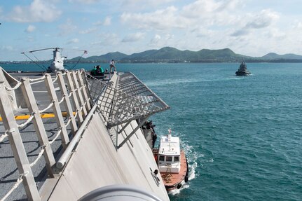 170602-N-PD309-004 GULF OF THAILAND (June 2, 2017) Sailors help a pilot depart the ship during sea and anchor detail aboard littoral combat ship USS Coronado (LCS 4) during Cooperation Afloat Readiness and Training (CARAT) Thailand. CARAT is a series of Pacific Command-sponsored, U.S Pacific Fleet-led bilateral exercises held annually in South and Southeast Asia to strengthen relationships and enhance force readiness. CARAT exercise events cover a broad range of naval skill areas and disciplines including surface, undersea, air, and amphibious warfare; maritime security operations; riverine, jungle, and explosive ordnance disposal operations; combat construction; diving and salvage; search and rescue; maritime patrol and reconnaissance aviation; maritime domain awareness; military law, public affairs and military medicine; and humanitarian assistance and disaster response. (U.S. Navy photo by Mass Communication Specialist 3rd Class Deven Leigh Ellis/Released)