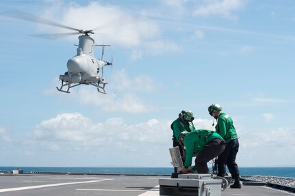 170602-N-PD309-051 GULF OF THAILAND (June 2, 2017) An MQ-8B Firescout unmanned aerial vehicle takes flight aboard littoral combat ship USS Coronado (LCS 4) during Cooperation Afloat Readiness and Training (CARAT) Thailand. CARAT is a series of Pacific Command-sponsored, U.S Pacific Fleet-led bilateral exercises held annually in South and Southeast Asia to strengthen relationships and enhance force readiness. CARAT exercise events cover a broad range of naval skill areas and disciplines including surface, undersea, air, and amphibious warfare; maritime security operations; riverine, jungle, and explosive ordnance disposal operations; combat construction; diving and salvage; search and rescue; maritime patrol and reconnaissance aviation; maritime domain awareness; military law, public affairs and military medicine; and humanitarian assistance and disaster response. (U.S. Navy photo by Mass Communication Specialist 3rd Class Deven Leigh Ellis/Released)