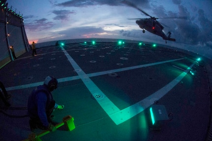 170602-N-PD309-156 GULF OF THAILAND (June 2, 2017) An MH-60S Seahawk helicopter prepares to land aboard littoral combat ship USS Coronado (LCS 4) during cross-deck flight operations in support of Cooperation Afloat Readiness and Training (CARAT) Thailand. CARAT is a series of Pacific Command-sponsored, U.S Pacific Fleet-led bilateral exercises held annually in South and Southeast Asia to strengthen relationships and enhance force readiness. CARAT exercise events cover a broad range of naval skill areas and disciplines including surface, undersea, air, and amphibious warfare; maritime security operations; riverine, jungle, and explosive ordnance disposal operations; combat construction; diving and salvage; search and rescue; maritime patrol and reconnaissance aviation; maritime domain awareness; military law, public affairs and military medicine; and humanitarian assistance and disaster response. (U.S. Navy photo by Mass Communication Specialist 3rd Class Deven Leigh Ellis/Released)