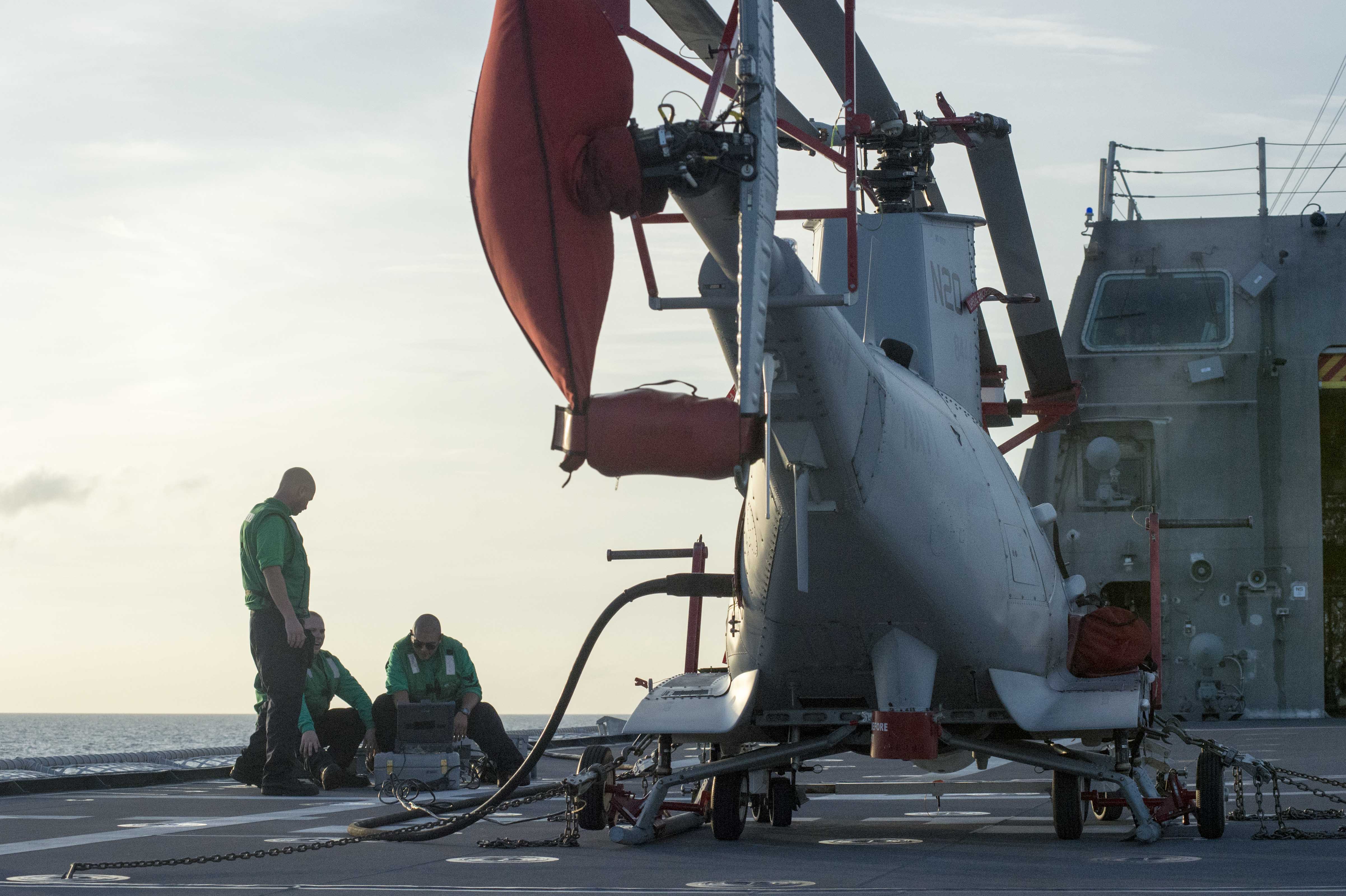 170604-N-PD309-066 GULF OF THAILAND (June 4, 2017) Sailors assigned to the "Wildcards" of Helicopter Sea Combat Squadron 23 conduct pre-flight checks on the MQ-8B Firescout unmanned aerial vehicle aboard littoral combat ship USS Coronado (LCS 4) during Cooperation Afloat Readiness and Training (CARAT) Thailand. CARAT is a series of Pacific Command-sponsored, U.S Pacific Fleet-led bilateral exercises held annually in South and Southeast Asia to strengthen relationships and enhance force readiness. CARAT exercise events cover a broad range of naval skill areas and disciplines including surface, undersea, air, and amphibious warfare; maritime security operations; riverine, jungle, and explosive ordnance disposal operations; combat construction; diving and salvage; search and rescue; maritime patrol and reconnaissance aviation; maritime domain awareness; military law, public affairs and military medicine; and humanitarian assistance and disaster response. (U.S. Navy photo by Mass Communication Specialist 3rd Class Deven Leigh Ellis/Released)