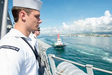 170619-N-PD309-007 CEBU, Philippines (June 19, 2017) Naval Aircrewman (Helicopter) 2nd Class Jeffrey Marr mans the rail aboard littoral combat ship USS Coronado (LCS 4) while pulling into Cebu, Philippines for Maritime Training Activity Sama Sama. Coronado is on a rotational deployment in U.S. 7th Fleet area of responsibility, patrolling the region's littorals and working hull-to-hull with partner navies to provide 7th Fleet with the flexible capabilities it needs now and in the future. (U.S. Navy photo by Mass Communication Specialist 3rd Class Deven Leigh Ellis/Released)