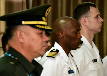 170619-N-QV906-016 CEBU, Philippines (June 19, 2017) Commodore, Destroyer Squadron 7 Capt. Lex Walker (center) stands during the inaugural opening ceremony for Maritime Training Activity (MTA) Sama Sama 2017 at Naval Forces Central in Cebu, Philippines, June 16.  MTA Sama Sama is a bilateral maritime exercise between U.S. and Philippine naval forces and is designed to strengthen cooperation and interoperabillty between the nations' armed forces.  (U.S. Navy photo by Mass Communication Specialist 1st Class Micah Blechner/RELEASED)