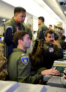 170622-N-QV906-064 CEBU, Philippines (June 22, 2017) U.S. Navy Lt. Carson Burton (bottom left) and Lt. j.g. Nicholas Wohar (right) of Combat Air Crew 4 attached to Patrol Squadron 26 (VP-26) demonstrate the capabilities of a P-8 Poseidon aircraft during a demonstration flight for Maritime Training Activity (MTA) Sama Sama 2017 in Cebu, Philippines, June 22.  MTA Sama Sama is a bilateral maritime exercise between U.S. and Philippine naval forces and is designed to strengthen cooperation and interoperability between the nations' armed forces.  (U.S. Navy photo by Mass Communication Specialist 1st Class Micah Blechner/RELEASED)