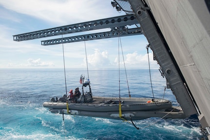 170623-N-PD309-098 BOHOL SEA (June 23, 2017) Littoral combat ship USS Coronado (LCS 4) uses a twin-boom extensible crane to recover an 11-meter rigid-hull inflatable boat during an exercise with the Philippine Navy for Maritime Training Activity (MTA) Sama Sama 2017. MTA Sama Sama is a bilateral maritime exercise between U.S. and Philippine naval forces and is designed to strengthen cooperation and interoperability between the nations' armed forces.  (U.S. Navy photo by Mass Communication Specialist 3rd Class Deven Leigh Ellis/Released)