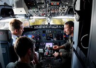 170623-N-QV906-082 CEBU, Philippines (June 23, 2017) Lt. Ryan Johnson (right) and Lt. Carson Burton (bottom left) of Combat Air Crew 4 attached to Patrol Squadron 26 (VP-26) discuss the intricacies of a P-8 Poseidon aircraft cockpit during Maritime Training Activity (MTA) Sama Sama in Cebu, Philippines, June 23.  MTA Sama Sama is a bilateral maritime exercise between U.S. and Philippine naval forces and is designed to strengthen cooperation and interoperability between the nations' armed forces.  (U.S. Navy photo by Mass Communication Specialist 1st Class Micah Blechner/RELEASED)
