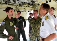 170623-N-QV906-126 CEBU, Philippines (June 23, 2017) Lt. Carson Burton (left), and Lt. Mason Bailey, and Aviation Ordnanceman 2nd Class Joseph Wondolowski, of Combat Air Crew 4 attached to Patrol Squadron 26 (VP-26), discuss the capabilities of a P-8 Poseidon aircraft inside its weapons bay during Maritime Training Activity (MTA) Sama Sama in Cebu, Philippines, June 23.  MTA Sama Sama is a bilateral maritime exercise between U.S. and Philippine naval forces and is designed to strengthen cooperation and interoperability between the nations' armed forces.  (U.S. Navy photo by Mass Communication Specialist 1st Class Micah Blechner/RELEASED)
