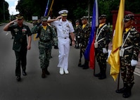 170623-N-QV906-224 CAMP LAPU-LAPU, Philippines (June 23, 2017) Rear Adm. Don Gabrielson (middle), Commander, Logistics Group Western Pacific, and Maj. Gen. Oscar Lactao (left), Commander, Armed Forces of the Philippines Central Command, perform a Command Review during Maritime Training Activity (MTA) Sama Sama 2017 at Camp Lapu-Lapu, Philippines, June 23.  MTA Sama Sama is a bilateral maritime exercise between U.S. and Philippine naval forces and is designed to strengthen cooperation and interoperability between the nations' armed forces.  (U.S. Navy photo by Mass Communication Specialist 1st Class Micah Blechner/RELEASED)
