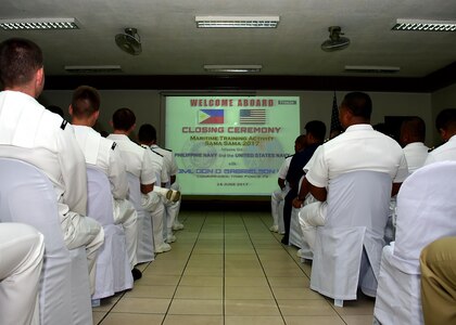 170624-N-QV906-047 CEBU, Philippines (June 24, 2017) Servicemembers from the U.S. Navy and the Armed Forces of the Philippines conduct the closing ceremony for Maritime Training Activity (MTA) Sama Sama 2017 in Cebu, Philippines, June 24.  MTA Sama Sama is a bilateral maritime exercise between U.S. and Philippine naval forces and is designed to strengthen cooperation and interoperability between the nations' armed forces.  (U.S. Navy photo by Mass Communication Specialist 1st Class Micah Blechner/RELEASED)