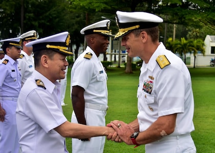 170529-N-QV906-107 SATTAHIP NAVAL BASE, Thailand (May 29, 2017) - Rear Adm. Don Gabrielson, Commander, Task Force 73, greets Rear Adm. Chaiyanun Nuntawit, Commander, Frigate Squadron II, at the opening ceremony of Cooperation Afloat Readiness and Training Thailand 2017 on Sattahip Naval Base May, Thailand, 29.  Commander, Cooperation Afloat Readiness and Training (CARAT) is a series of PACOM sponsored, U.S. Pacific Fleet led bilateral exercises held annually in South and Southeast Asia to strengthen relationships and enhance force readiness. CARAT exercise events cover a broad range of naval skill areas and disciplines including surface, undersea, air and amphibious warfare; maritime security operations; riverine, jungle and explosive ordnance disposal operations; combat construction; diving and salvage; search and rescue; maritime patrol and reconnaissance aviation; maritime domain awareness; military law, public affairs and military medicine; and humanitarian assistance, disaster response. (U.S. Navy photo by Mass Communication Specialist 1st Class Micah Blechner/RELEASED)