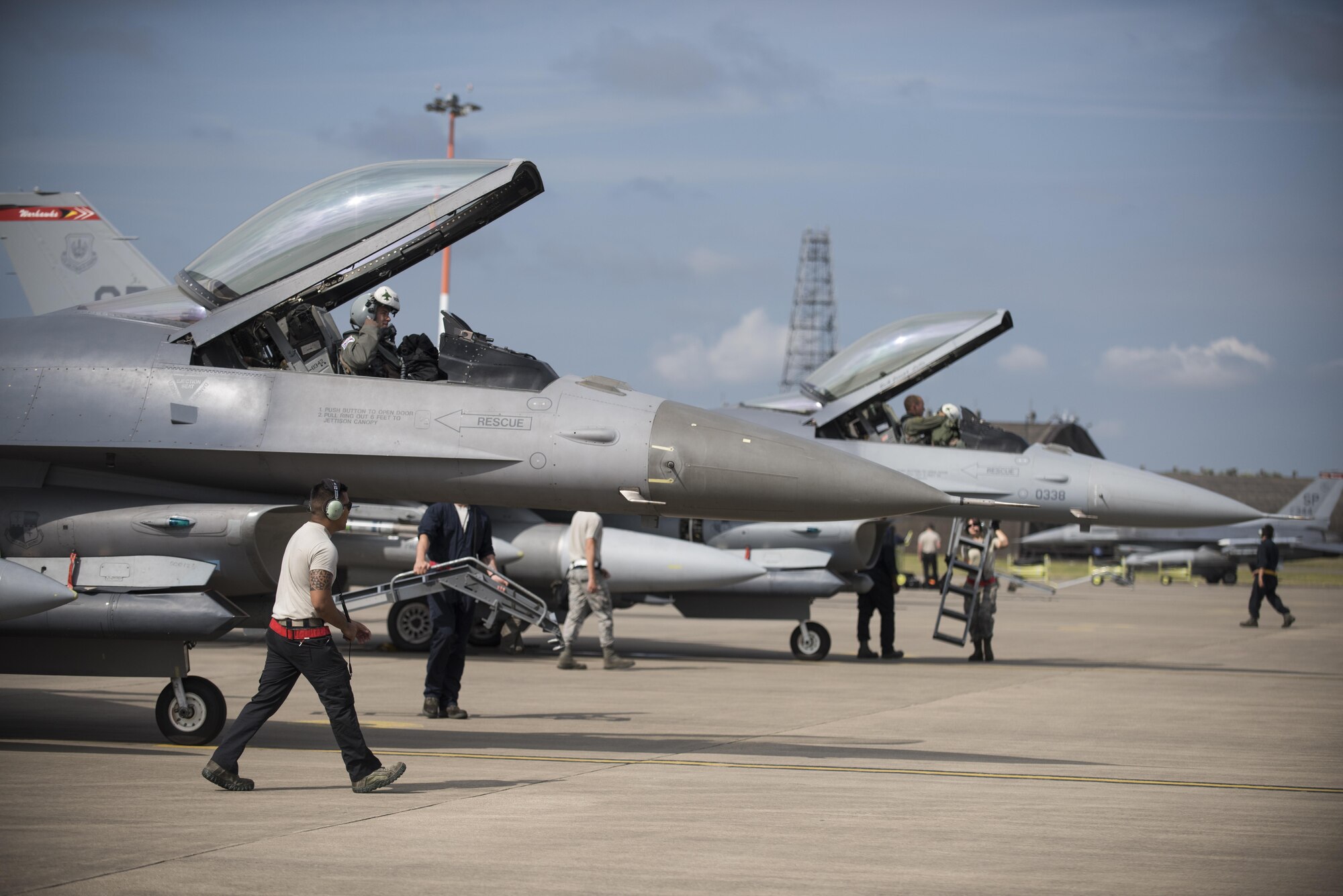 Several F-16 Fighting Falcon aircraft from the 52nd Fighter Wing, Spangdahlem Air Base, Germany, park after arriving at Royal Air Force Lakenheath, England, July 10. More than 260 Airmen and 18 F-16 Fighting Falcon aircraft from the 52nd FS will be participating in a flying training deployment here. (U.S. Air Force photo/Senior Airman Malcolm Mayfield)