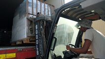 Senior Airman Jaylin, 380th Force Support Squadron storehouse manager, unloads pallets of food July 6, 2017, at an undisclosed location in southwest Asia. "I'm really proud to say that I'm working here. At the end of the day, I know that I helped the whole base with something important." said. "When it's all said and done I know I played a vital role in the mission by keeping everybody hydrated and healthy." (U.S. Air Force photo by Senior Airman Preston Webb)