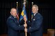 U.S. Air Force Col. Edward LaGrou, 52nd Medical Group commander, left, gives the ceremonial guidon to U.S. Air Force Lt. Col. Eric Chumbley, incoming 52nd Aerospace Medicine Squadron commander, right, during the 52nd AMDS change of command ceremony at Spangdahlem Air Base, Germany, July 10, 2017. (U.S. Air Force photo by Staff Sgt. Jonathan Snyder)