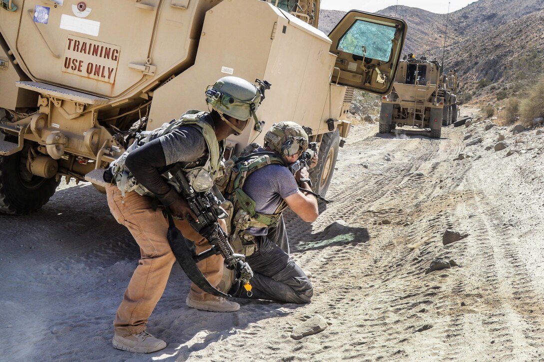 Soldiers role-playing as opposing forces engage blue forces soldiers during a simulated assault in the Alpine Pass, National Training Center, June 30, 2017. The OPFOR soldiers are assigned to the 11th Armored Cavalry Regiment. The blue force soldiers are assigned to the 4th Infantry Division’s 1st Stryker Brigade Combat Team. Army photo by Pfc. Austin Anyzeski