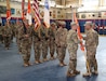 Lt. Gen. Michael Garrett, right, commanding general, U.S. Army Central, passes the unit’s colors to Brig. Gen. John Phillips, commander, 335th Signal Command (Theater)(Provisional), left, which signifies the passing of his trust and the responsibility of the unit to Phillips at Camp Arifjan, Kuwait, June 26, 2017.