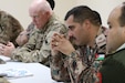 Col. Brent Johnson (left), Staff Judge Advocate for the 29th Infantry Division and Task Force Spartan, participates in a symposium on operational law and military justice with military judges from the Jordan Armed Forces- Arab Army April 25, 2017, near Amman, Jordan. The four-day symposium included U.S. Army and U.S. Air Force legal professionals from the U.S. Central Command and military judges from the Jordan Armed Forces- Arab Army. (U.S. Army National Guard photo by Master Sgt. A.J. Coyne)