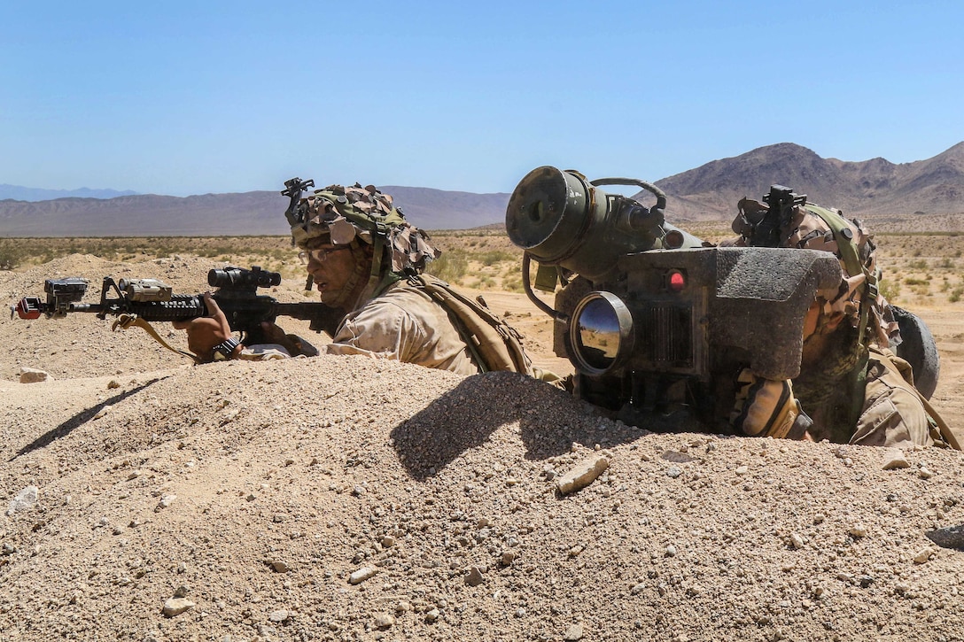 Marines prepare to fire a FGM-148 Javelin rocket to destroy maneuvering vehicles during a simulated assault outside the Alpine Pass at the National Training Center at Fort Irwin, Calif., June 30, 2017. Army photo by Pfc. Austin Anyzeski