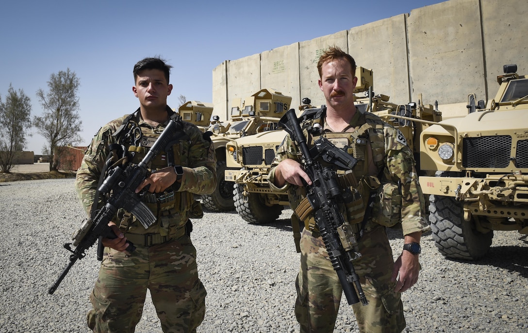 Airmen 1st Class Giovanni and Drew, 451st Expeditionary Support Squadron flightline security element members, deescalated a potential volatile situation during an incident where unknown convoy approached their post on Kandahar Airfield, Afghanistan. Their keen senses, trust in each other, communication with others and training all came together, effectively thwarting a potential catastrophe without having to resort to firing their weapons. (U.S. Air Force photo by Staff Sgt. Benjamin Gonsier)