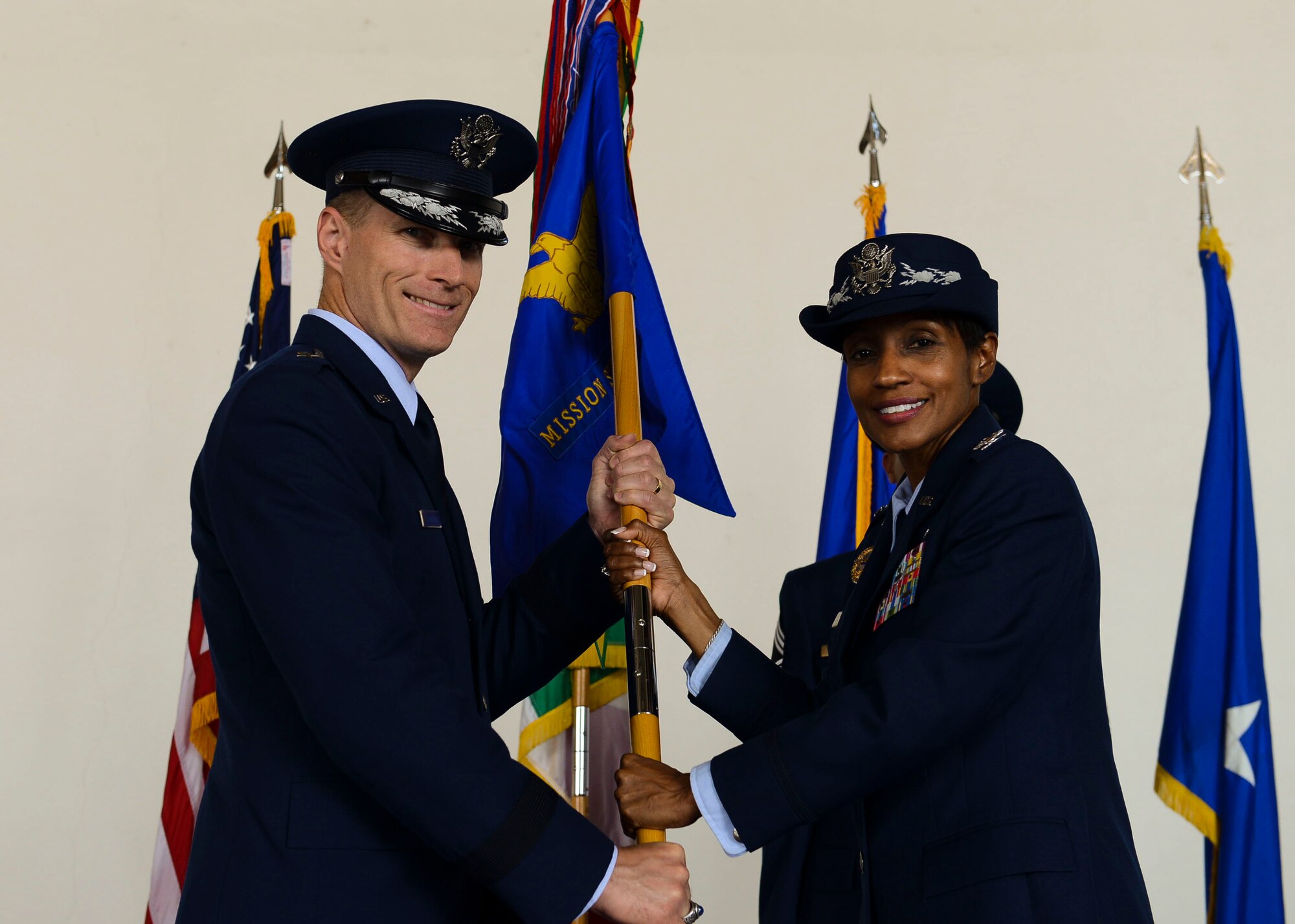 Col. Jeffrey York takes command of the 31st Mission Support Group from Col. Jenise Carroll during a change of command ceremony, July 7, 2017, at Aviano Air Base, Italy. Brig. Gen. Lance Landrum, 31st Fighter Wing commander, presided over the event. (U.S. Air Force photo by Staff Sgt. Austin Harvill)