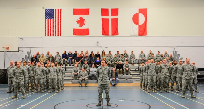 Airmen from the 821st Air Base Group stand in formation and attend the 821st ABG change of command, June 29, 2017, at Thule Air Base, Greenland. The 821st ABG operates and maintains the air base in support of missile warning, space surveillance, and satellite command and control operations and missions. (U.S. Air Force photo by Capt. Md Hussain)