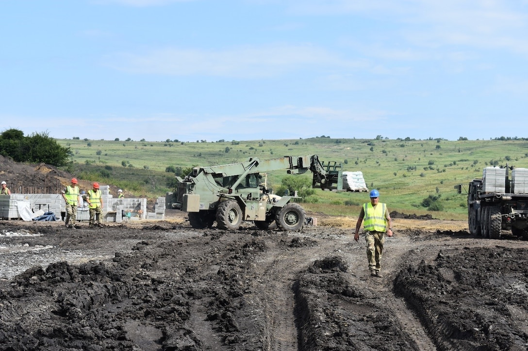 A Skytrak lifts construction materials for a Light Demolition Range in a joint effort by the 926th Engineer Brigade and the U.K. Royal Monmouthshire Royal Engineers (Militia). The construction project is a part of Operation Resolute Castle 2017 at the Joint National Training Center, Cincu, Romania. Resolute Castle is an exercise strengthening the NATO alliance and enhancing its capacity for joint training and response to threats within the region.