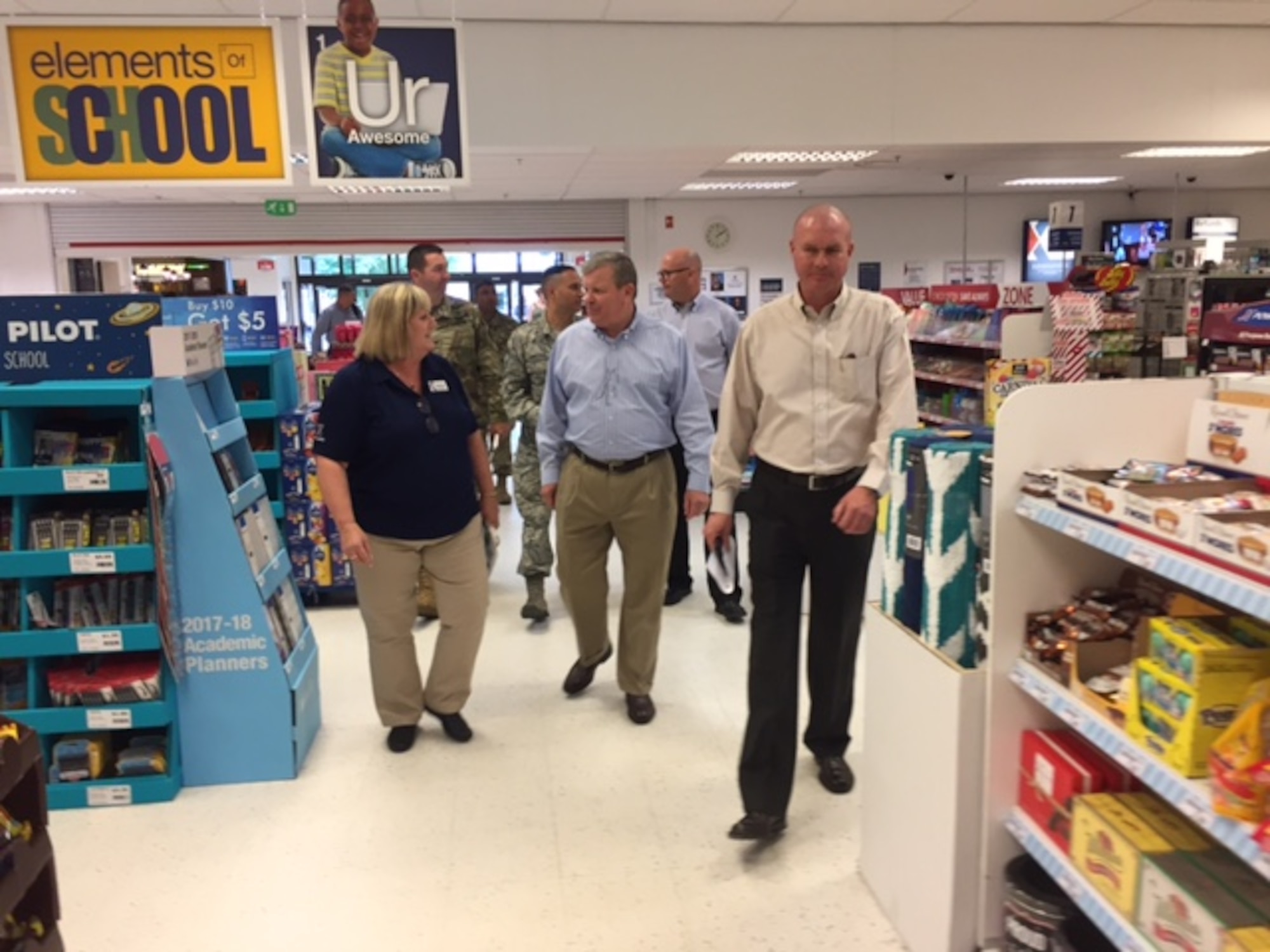 Army & Air Force Exchange Service Director/CEO Tom Shull visits the RAF Lakenheath Exchange July 7. Store Manager Sabina Brink and General Manager Ed Hicks showed Shull, who was visiting from the organization's HQ in Dallas, how the store takes care of Airmen and families living far from home. (Courtesy photo)