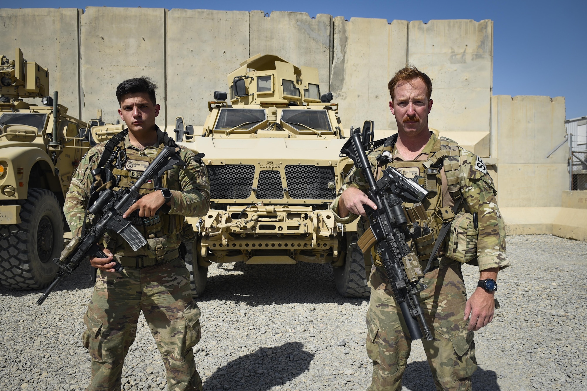 Airmen 1st Class Giovanni and Drew, 451st Expeditionary Support Squadron flightline security element members, deescalated a potential volatile situation during an incident where unknown convoy approached their post on Kandahar Airfield, Afghanistan. Their keen senses, trust in each other, communication with others and training all came together, effectively thwarting a potential catastrophe without having to resort to firing their weapons. (U.S. Air Force photo by Staff Sgt. Benjamin Gonsier)  