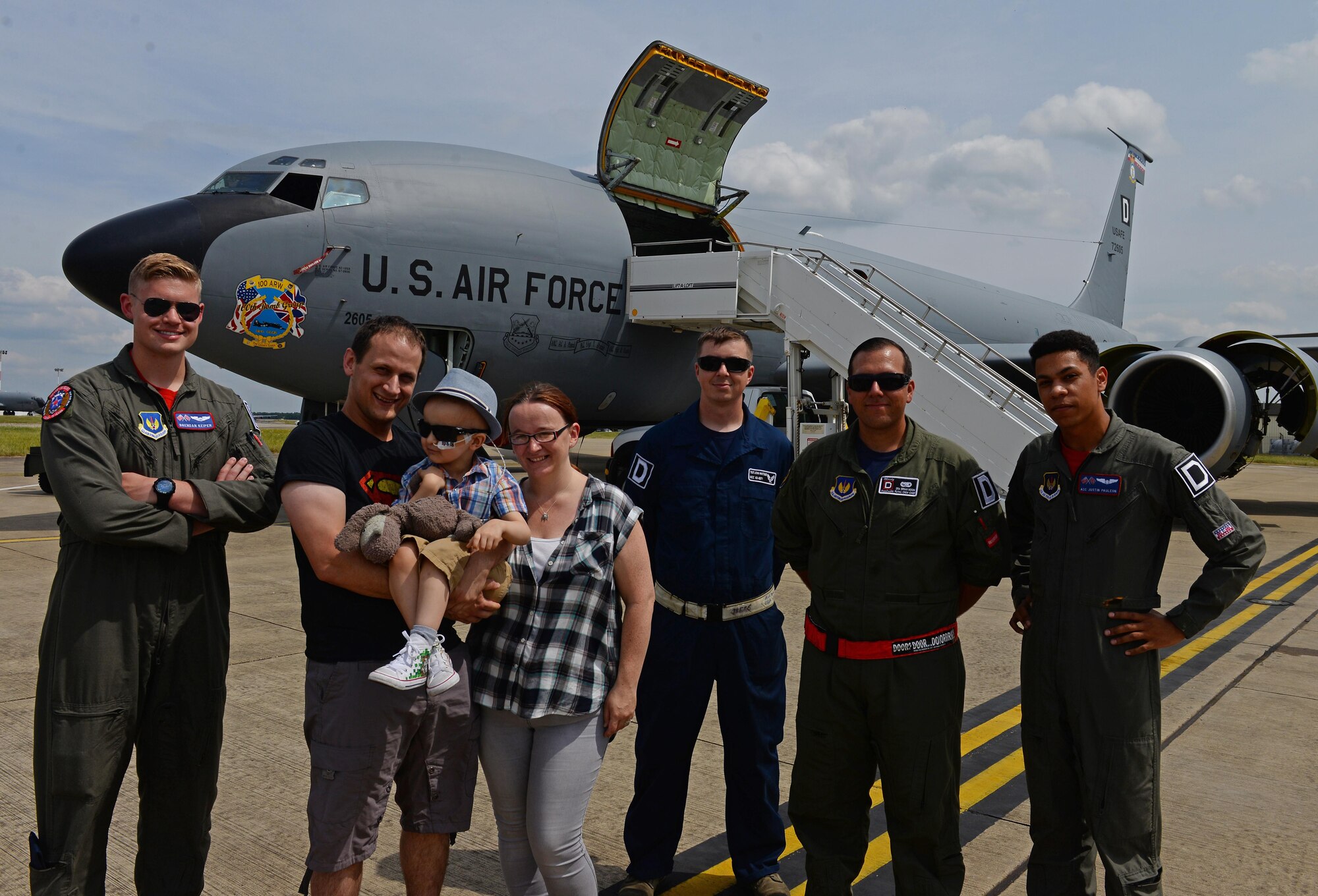 U.S. Airmen from RAF Mildenhall stand with Jay Davidson and his parents during a Pilot for a Day visit July 7, 2017, on RAF Mildenhall, England. Jay was diagnosed with high-risk medulloblastoma in January 2017. After seven months of chemotherapy, Jay’s doctors told him the tumors have gone into remission. (U.S. Air Force photo by Staff Sgt. Micaiah Anthony)